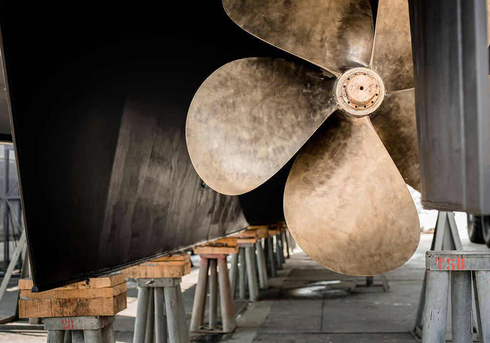 propeller of a superyacht hauled out in shipyard